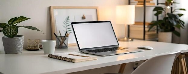 Remote worker with laptop at home office